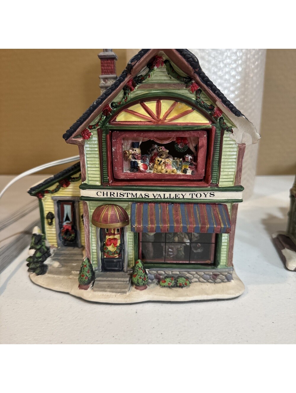 Christmas Valley Toys & Dolls" lighted porcelain number 56.56677- see pics-chip